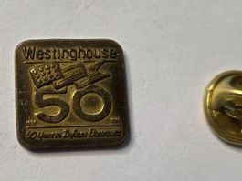 Pin's Westinghouse 50ème anniversaire vintage rare