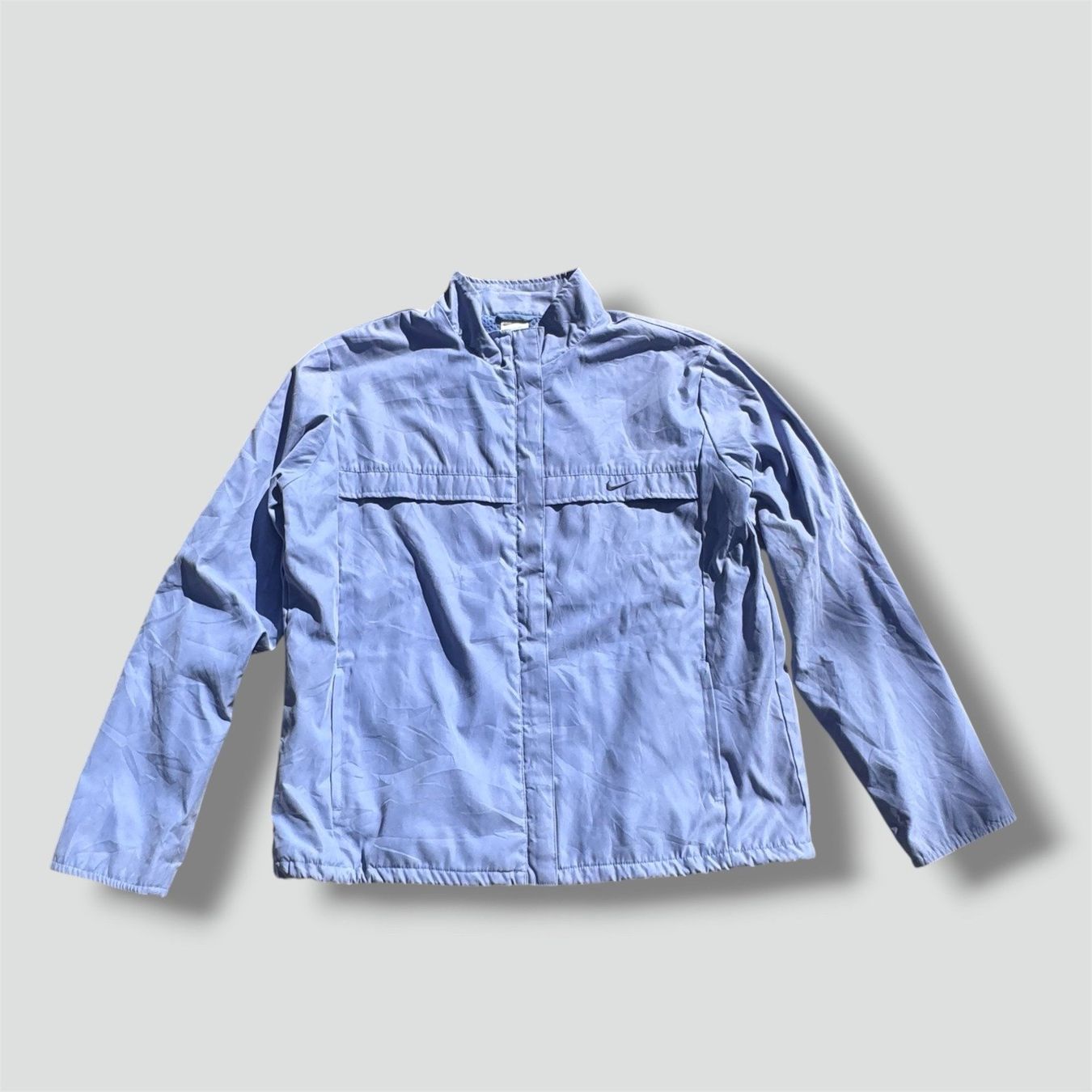 Nike Giacche: Nike vintage sky blue rain jacket – Usato da St. Gallen venduto da sourced_limited