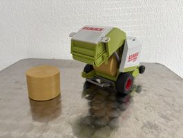 Spielzeug Rundballenpresse Claas Rollant 250 grün