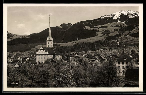 Cartoline postali: AK Kerns, Kirche und Dorf vor Bergen – Usato da Berlin venduto da bartko-reher