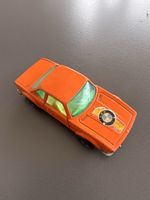Spielzeugauto orange mit grüner Scheibe guter Zustand
