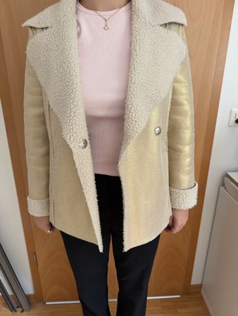 Veste femme dorée imitation peau retournée doublée