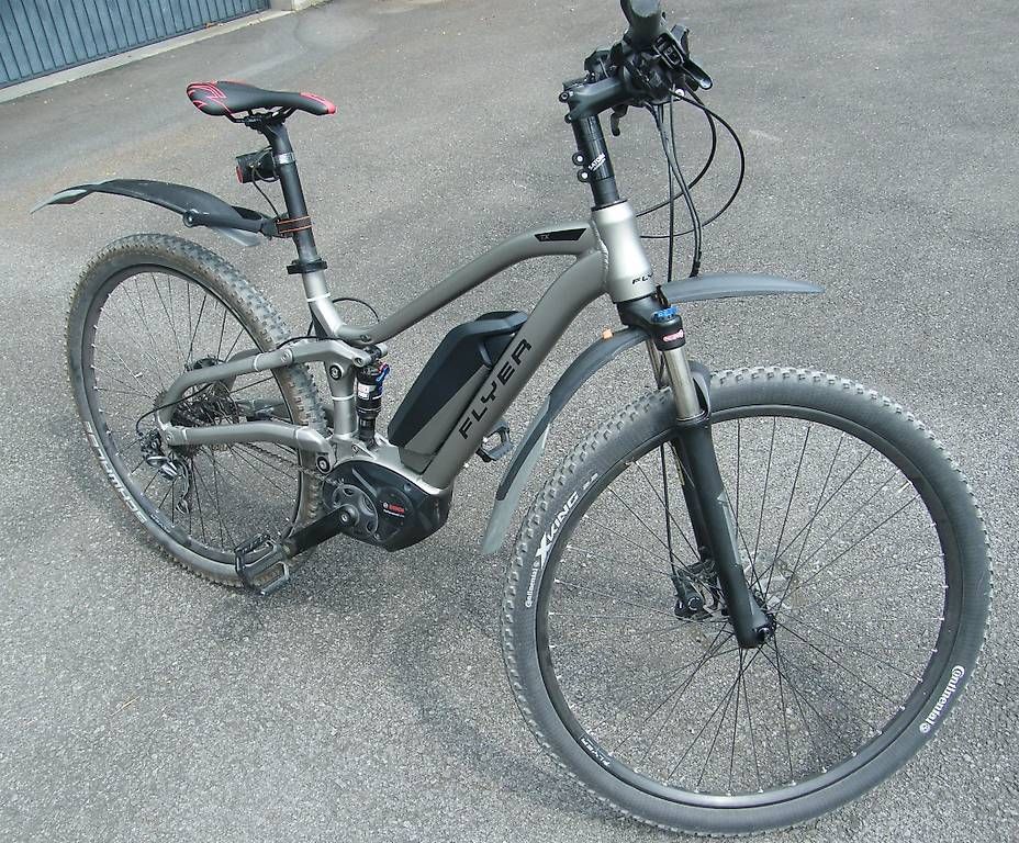 Flyer Velos: FLYER TX 7.10 E-MTB Fully in Silbergrau – Gebraucht aus Arth von dig_7skx