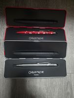 Caran d'Ache 849 stylos x2, rouge et argenté, dans boites