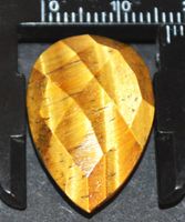 Edelstein L-9117 – Tigerauge Briolette 26x16mm facettiert 20