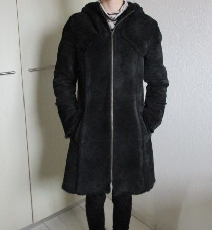 Mantel als Leder