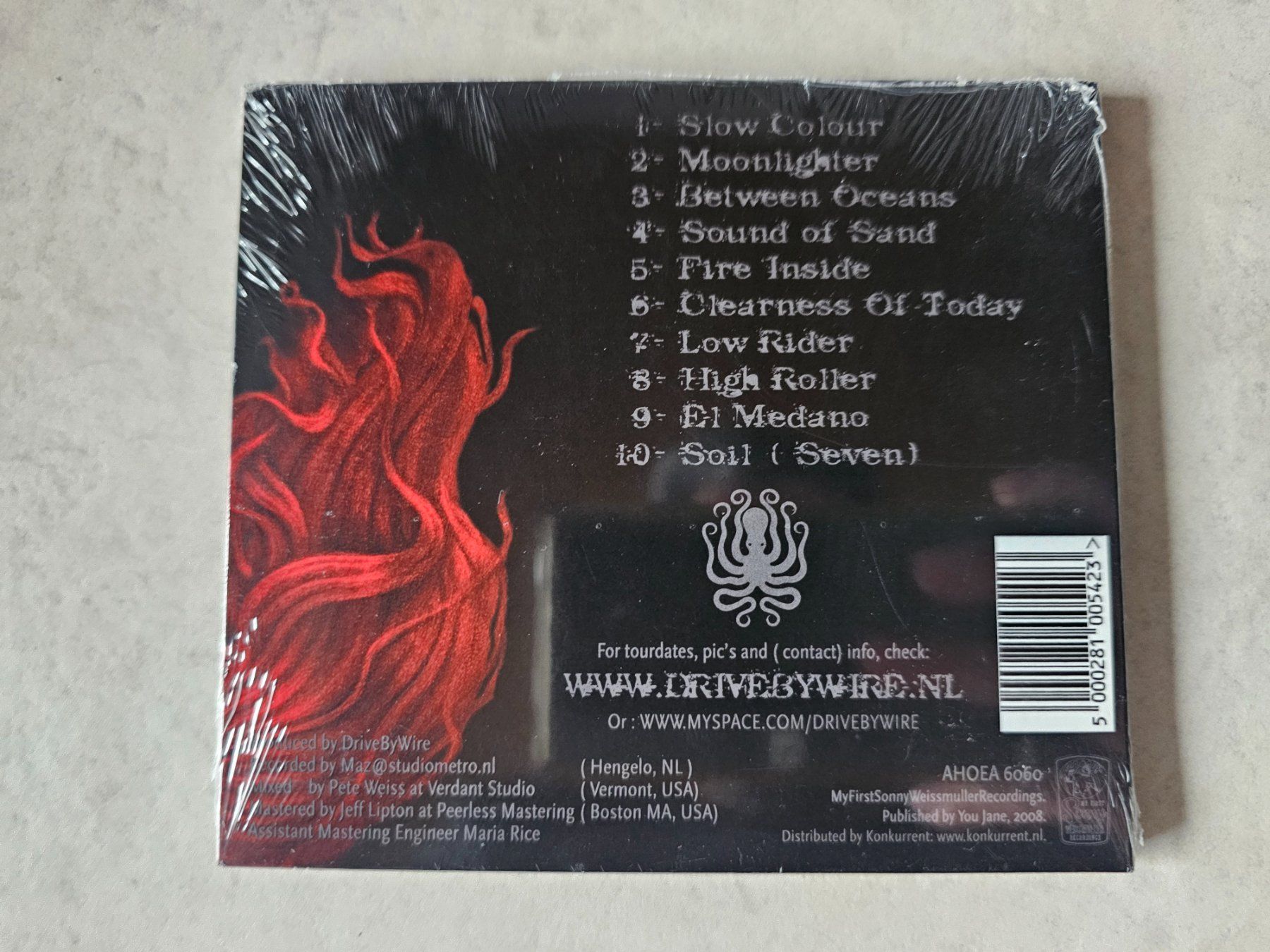 CD: Drive By Wire  -  Between Oceans  /  Fabrikneu – Nuovo e nell'imballaggio originale da Schneisingen venduto da backstore24 1