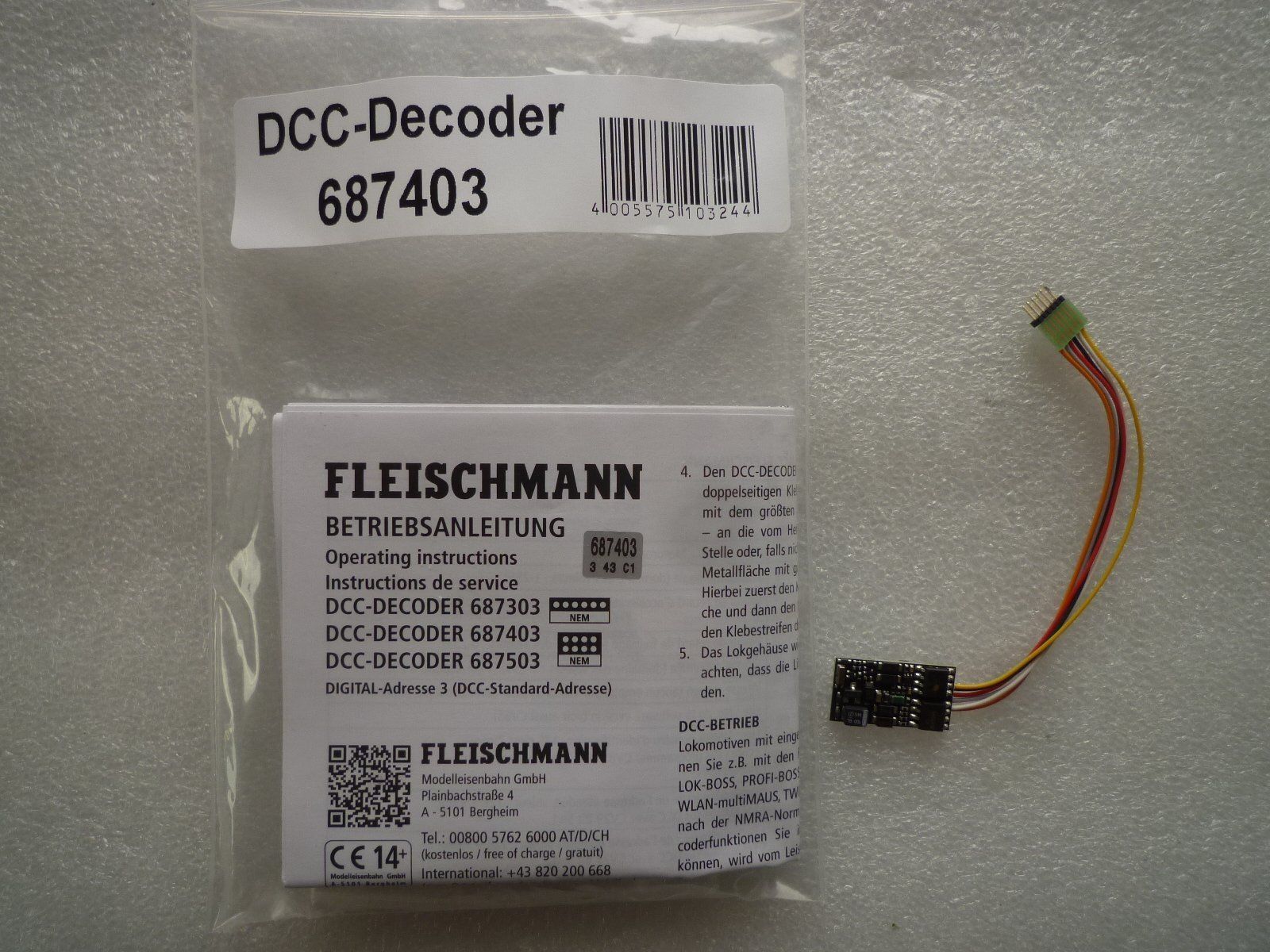Fleischmann Modellini di ferrovie: Fleischmann 687403 Dekoder DCC auch für Motorola – Nuovo e nell'imballaggio originale da Chevenez venduto da Railpassion