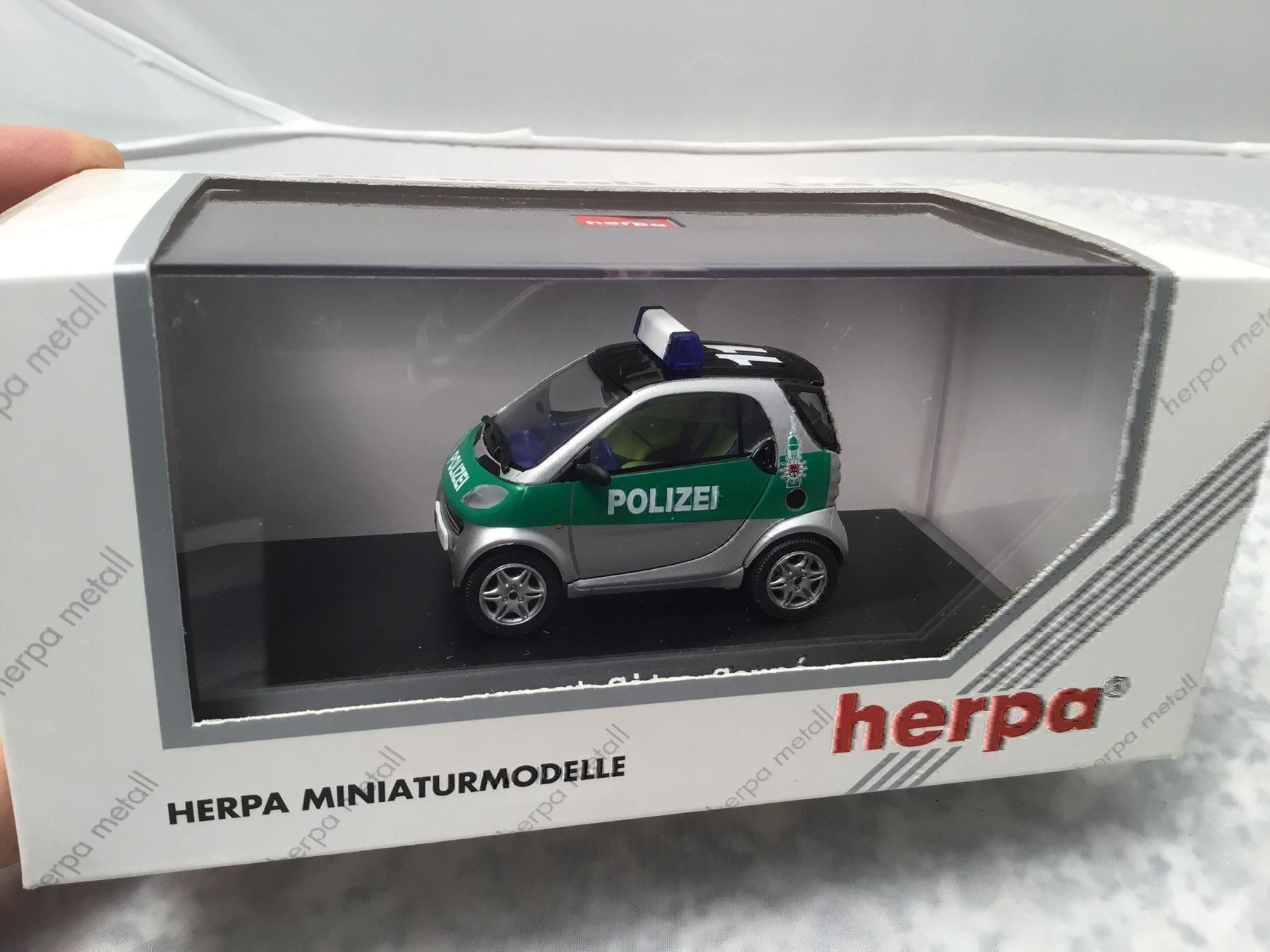 Smart Modellini d'auto: Polizei SMART – Nuovo e nell'imballaggio originale da Erlenbach im Simmental venduto da Model_box 2