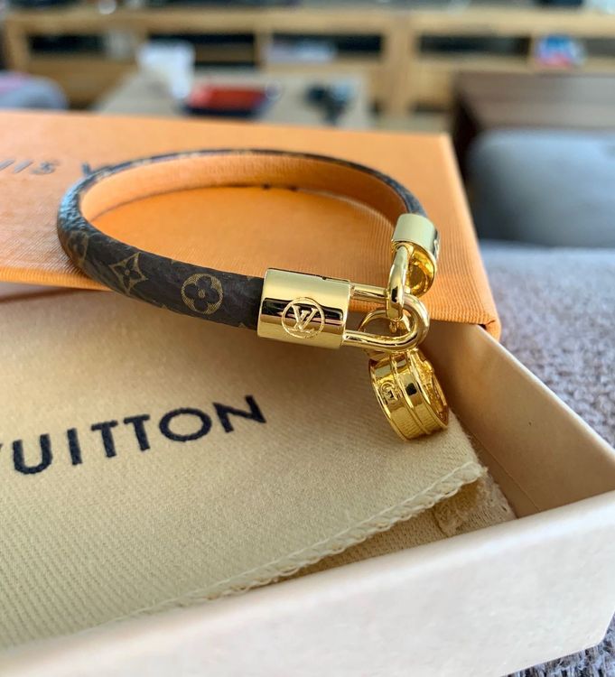 Shop Louis Vuitton Lv tribute bracelet (M6442F, M6442E) by