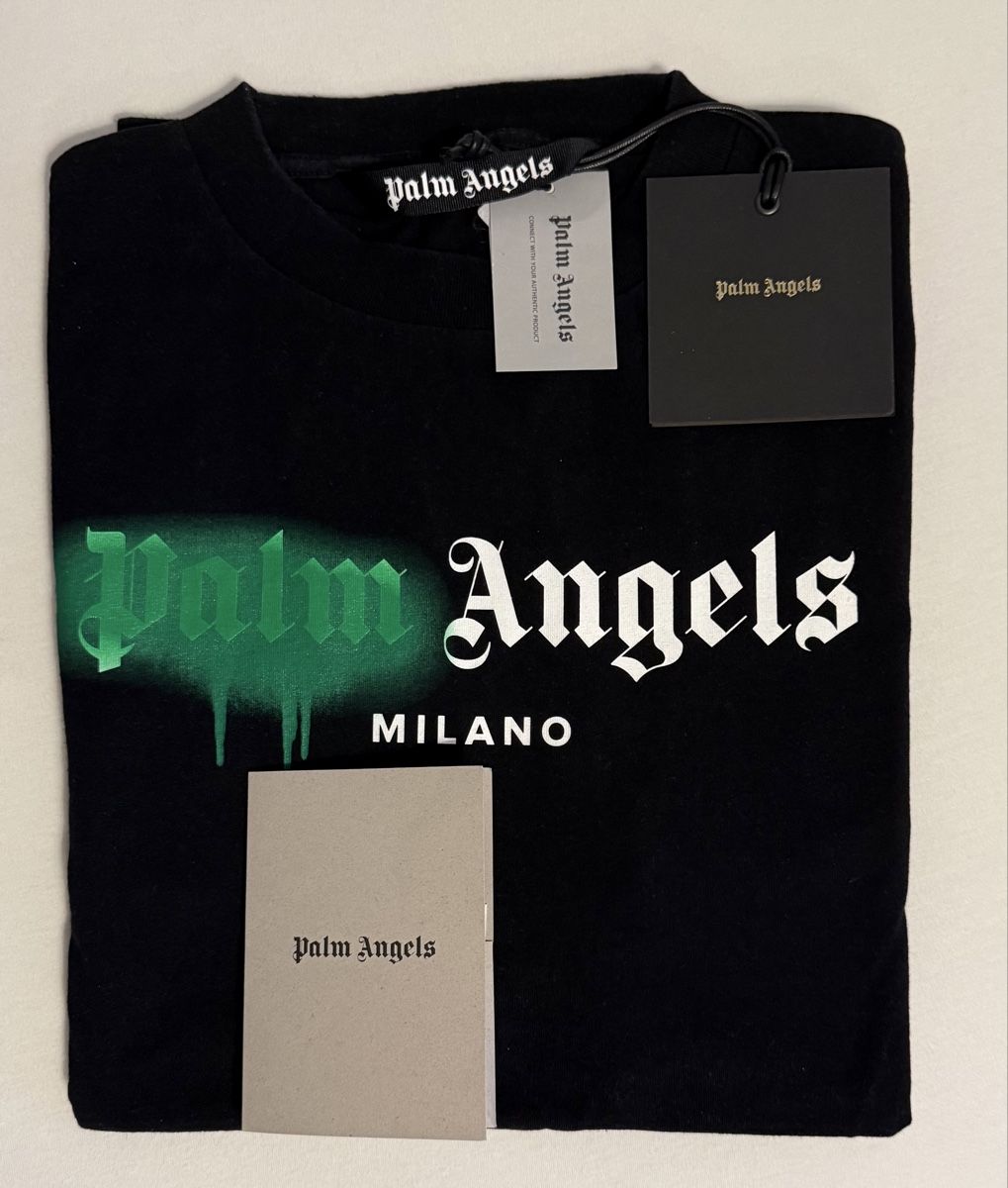 Palm Angels T-shirt: Palm Angels Milano Sprayed Logo Tee – Usato da Meggen venduto da O_E