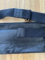 Serax Bea Mombaers black leather belt strap bag