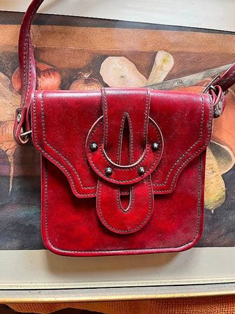 Defekte Kunstledertasche 