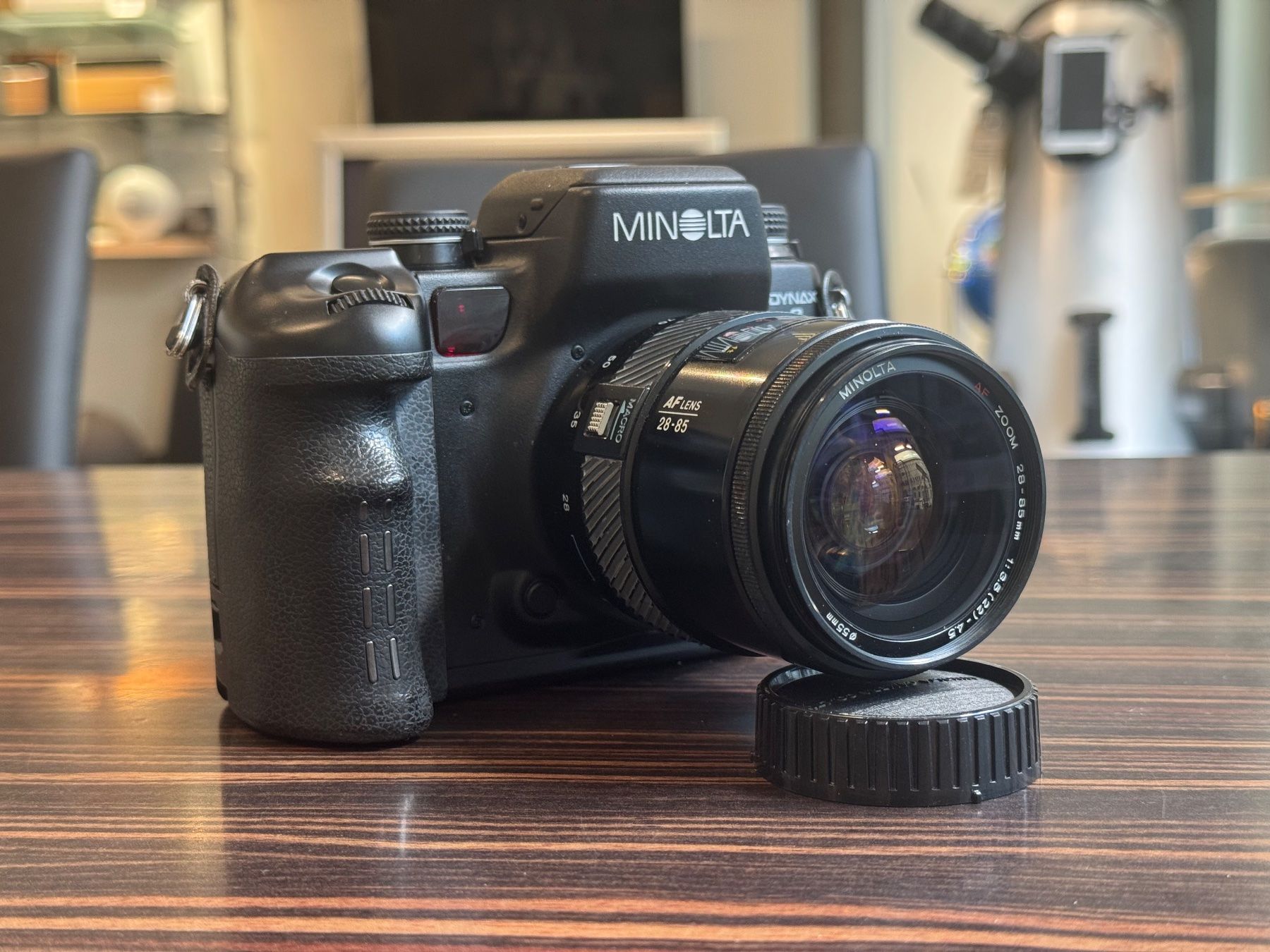 Minolta Fotocamera: Minolta Dynax 9 analog Spiegelreflexkamera mit Objektiv – Usato da Zürich venduto da KochphotoAG 1