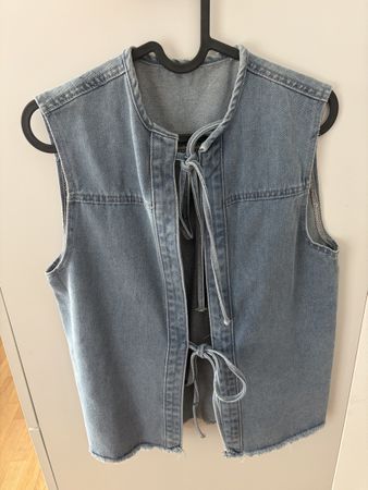 Gilet sans manches en jean bleu avec liens 