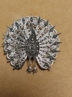 Majestätischer Pfau in 835er Silber be-