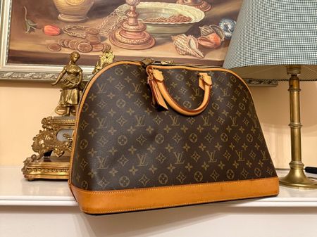 Louis Vuitton Monogram Alma Voyage MM Bag