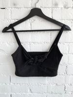 Schwarzes Crop Top