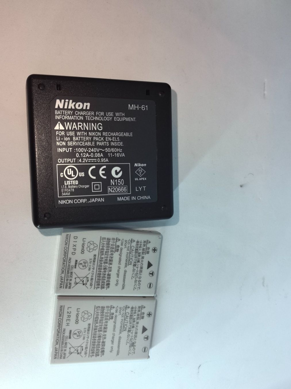 Nikon Caricatori & Batterie: Nikon MH-61 Lithium Battery Charger – Usato da Uster venduto da TOPPRICEE 1