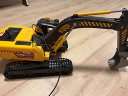 Spielzeug Bagger mit Fernbedienung gelb gebraucht