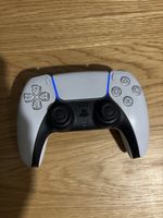Manette de PS 5 blanche en très bonne état 