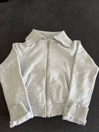 Veste zippée gris clair col montant bon état général