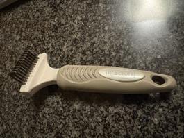 Brosse Le Salon pour chien/chat - Démêlez en douceur!
