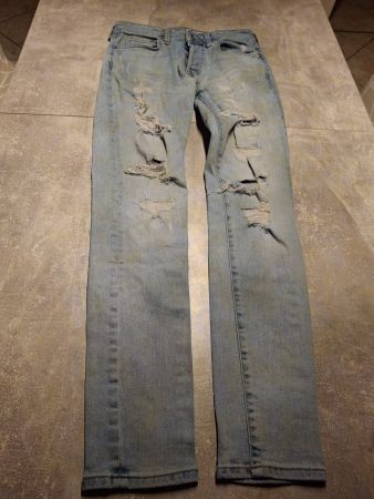 Pantalon jeans avec trous taille S marque Denim
