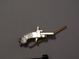 Pistolet décoratif miniature métal argenté collection éta...