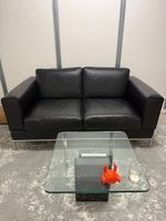 Schwarzes Ledersofa
