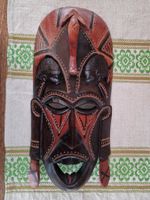 Holzmaske und Holzbesteck aus Afrika