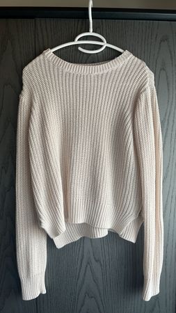 Pull en maille rose clair
