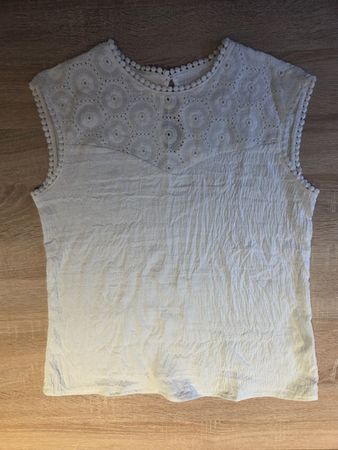 Top blanc sans manches taille S état neuf