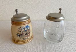 2 Bierkrüge aus Keramik und Glas mit Zinndeckel