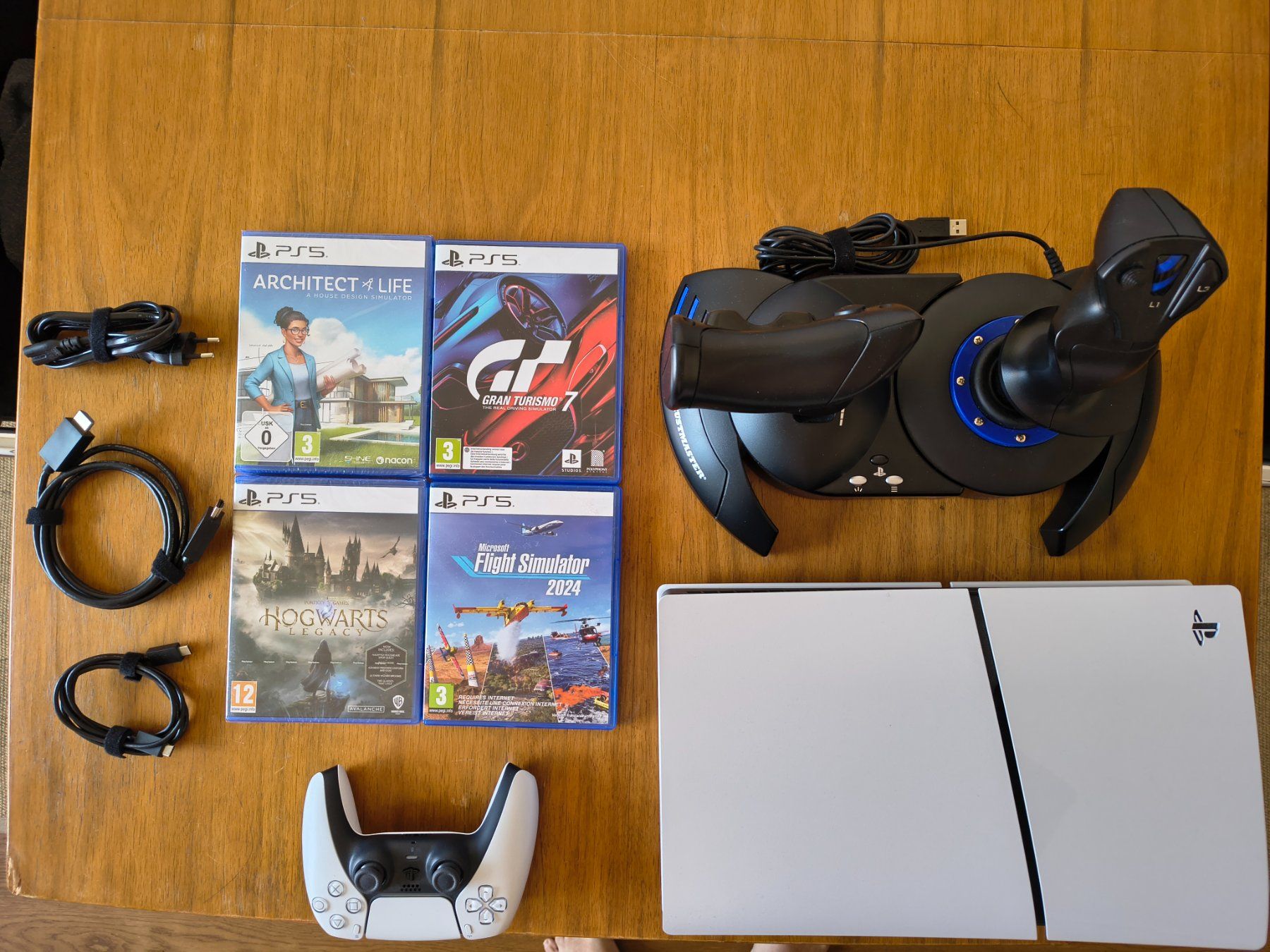 Sony Consoles: PS5 Disc Edition + HOTAS Joystick + 4 Spiele | Fast neu – D'occasion à Burgdorf par smilingfish2013