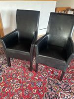 2 Kunstlederstühle