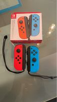 Nintendo Switch Joy-Con Set Neonrot Neonblau nie gebraucht.