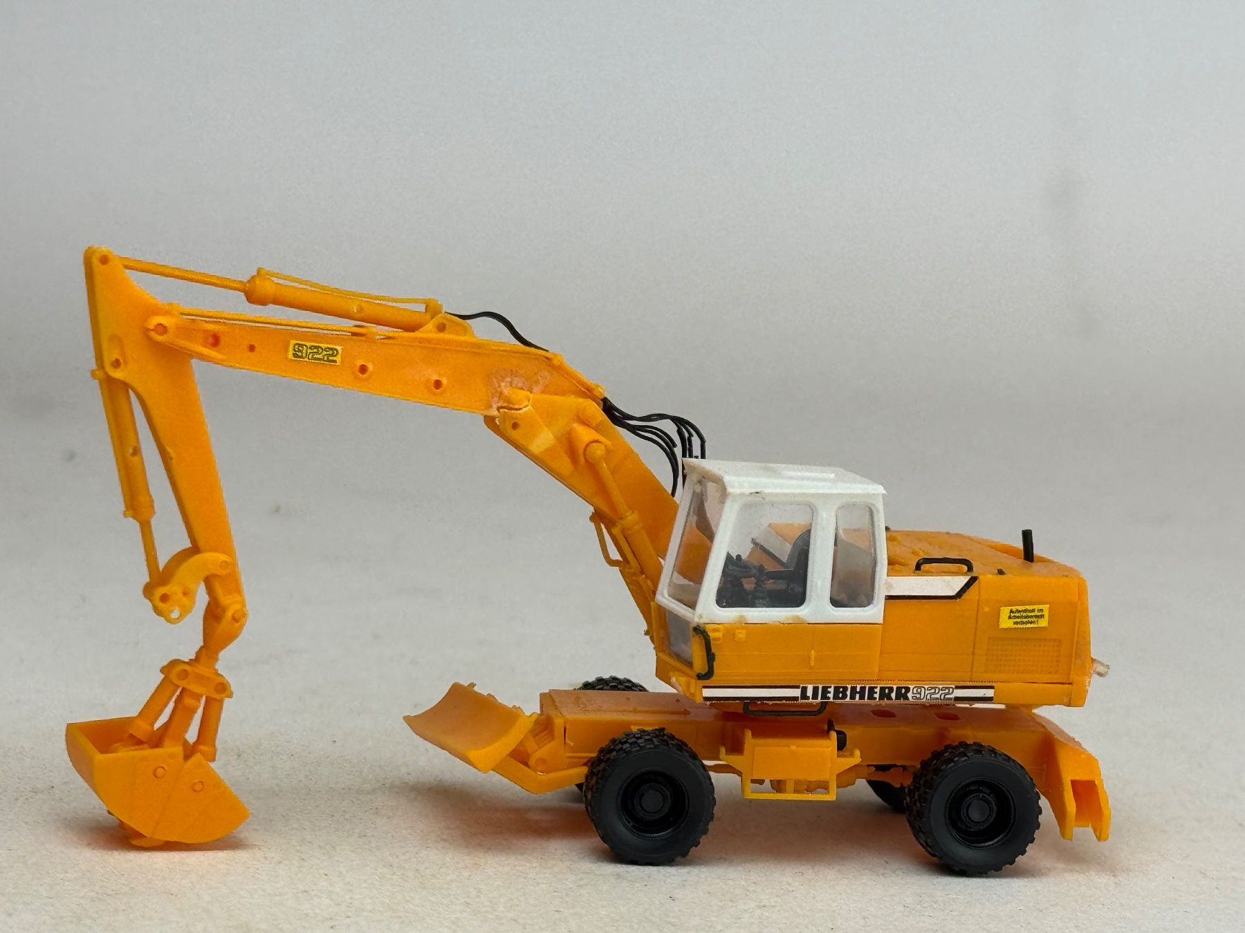 Kibri Modellini d'auto: VE1- Kibri Greifbagger Liebherr orange – Usato da Elm venduto da Wikmtz