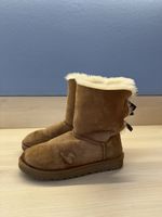 Brown UGG Boots with Bows - Cozy Winter Essentials!