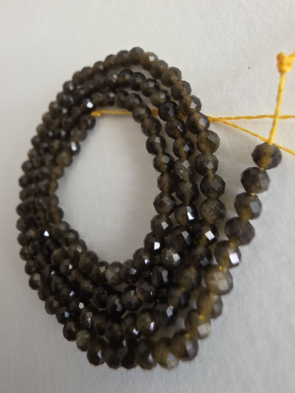 Minerali & Pietre curative: Obsidian facettiert 3mm. Strang – Nuovo e nell'imballaggio originale da Menziken venduto da Mirager 1