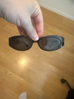 Sonnenbrille Meller schwarz ovaler Rahmen guter Zustand