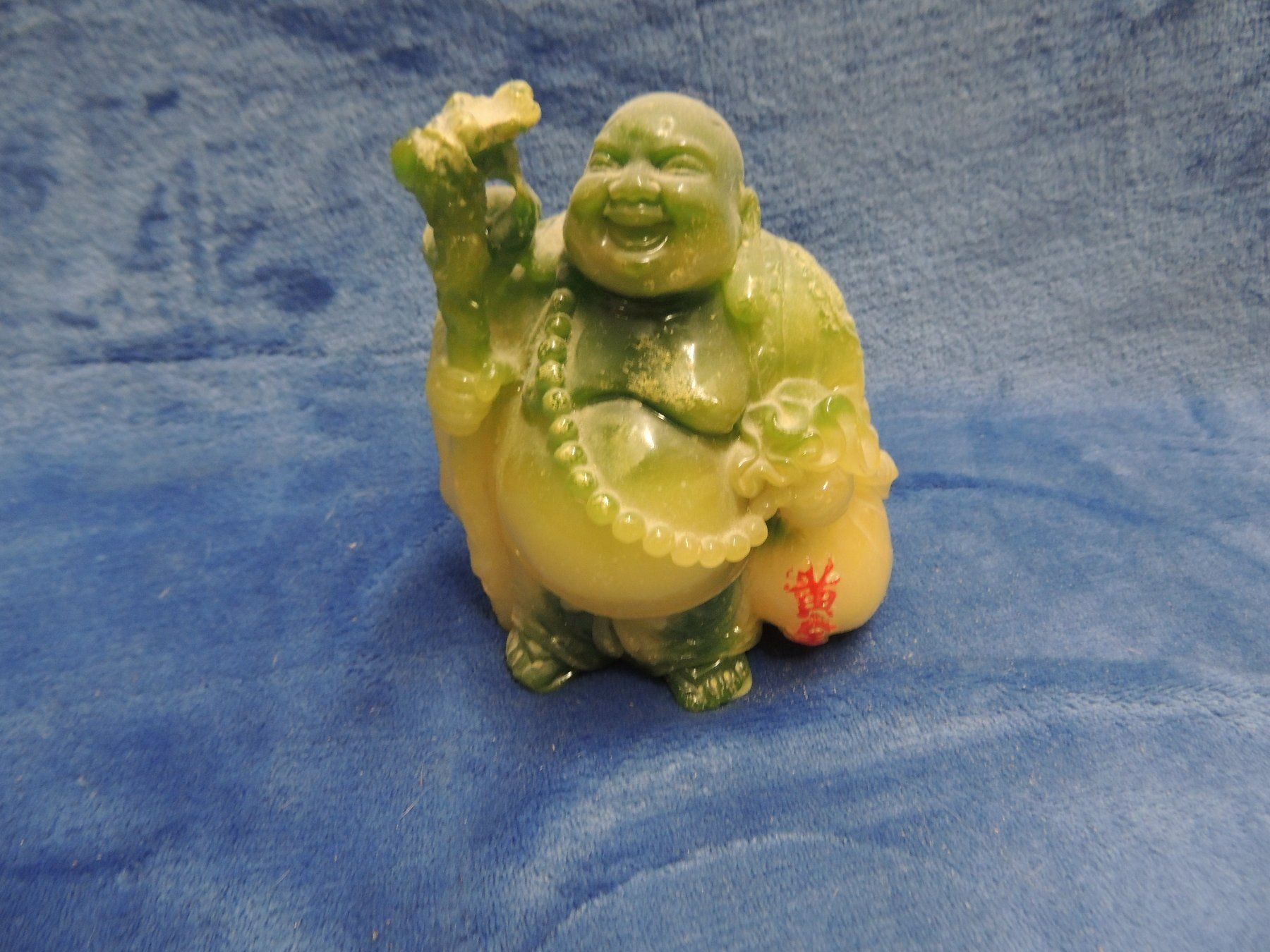Statuette: Buddha grün/gelb aus Kunststoff – Usato da Mollis venduto da Hg