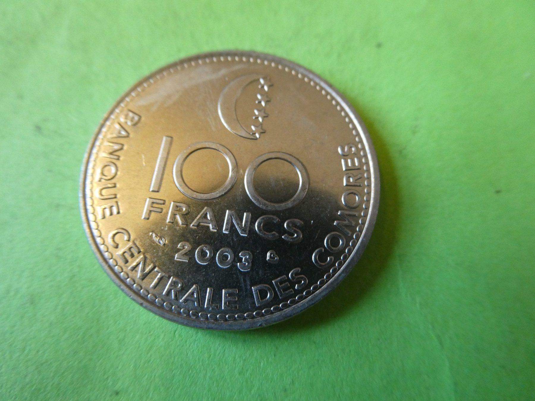 Tutti le monete: Comores 2003, 100 Francs     unzirkuliert – Usato da Hinterforst venduto da Rohusri 1