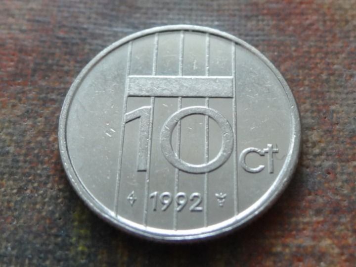 Tutti le monete: PAYS-BAS  Nederland  10  Cent  1992 – Usato da Romanel-sur-Lausanne venduto da Swift13