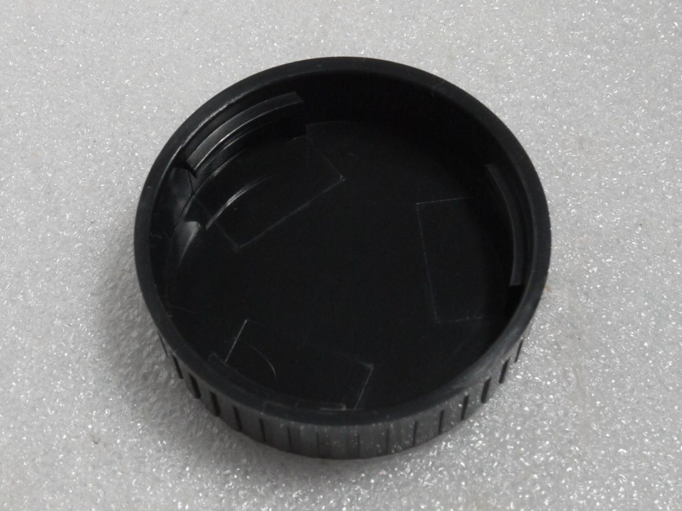 Minolta Obiettivi: Minolta MD Rückdeckel / bouchon arrière / Rear Cap. MD. – Nuovo e nell'imballaggio originale da Egg b. Zürich venduto da JCB 1