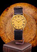 Tissot Saphir Uhr aus 18 Karat Gold mit Quarzwerk, perfekt