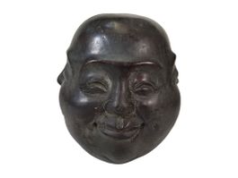 Buddha Kopf mit vier Gesichtern