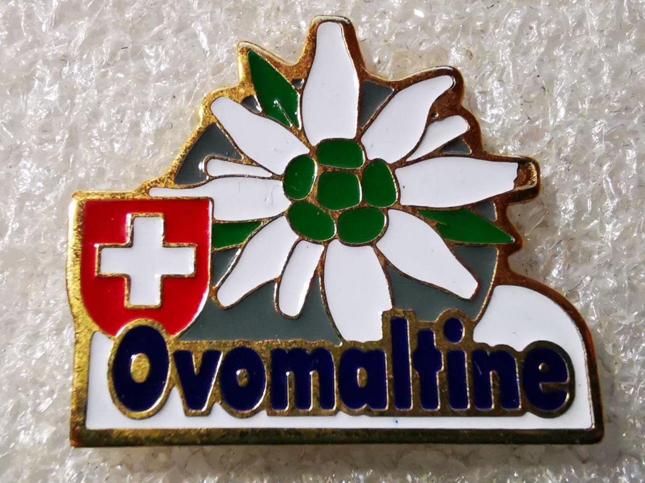 Placchette & Badge: Ansteckpin 13: Ovomaltine – Usato da Oppligen venduto da Pin-Fall-Shop