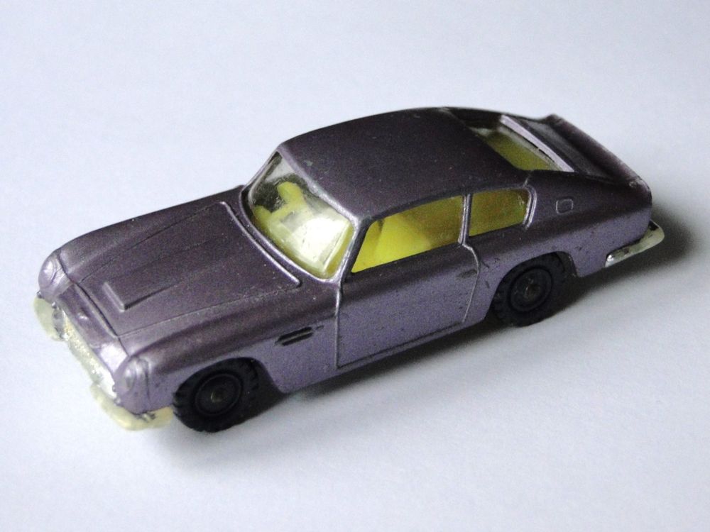 Lot 3 Miniatures 1/66: Husky Aston Martin, Matchbox Ford GT40, Penny Lancia Zagato