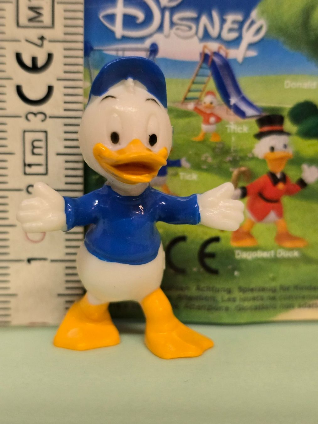 Disney Figurines: Trick Disney-Minifigur blau – Neuf avec emballage d'origine à Hornussen par Corvette- 4